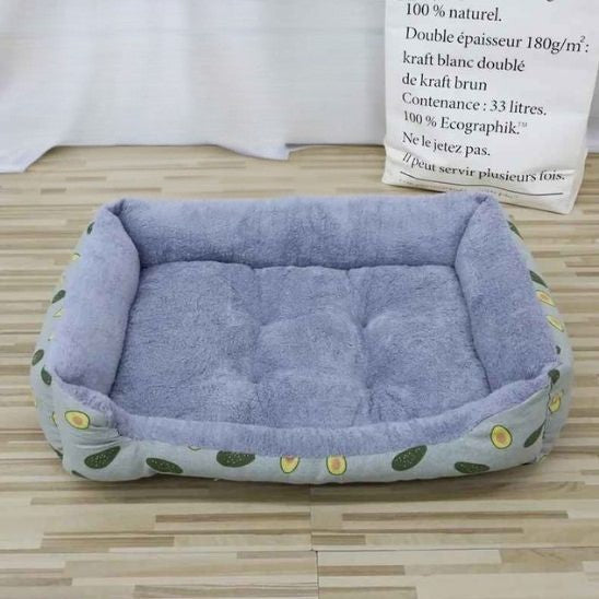 Coussin pour chat rectangulaire gris avec des motifs d'avocat.