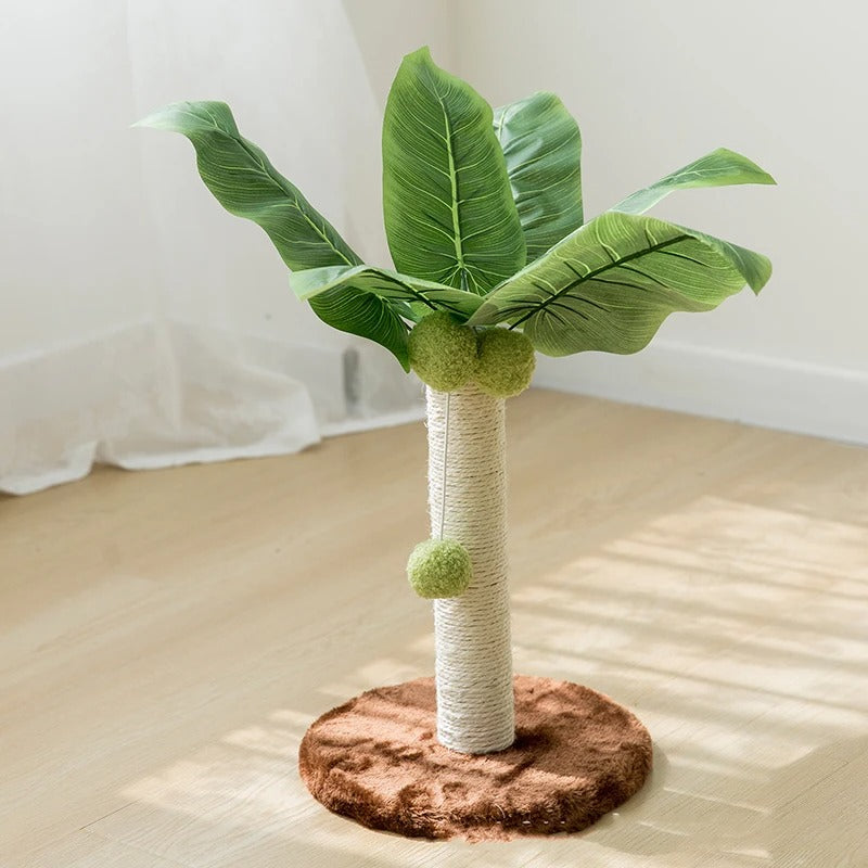 Un griffoir à chat en forme de palmier avec une base ronde marron et un poteau en sisal et des feuilles vertes artificielles avec des balles vertes suspendues en peluche