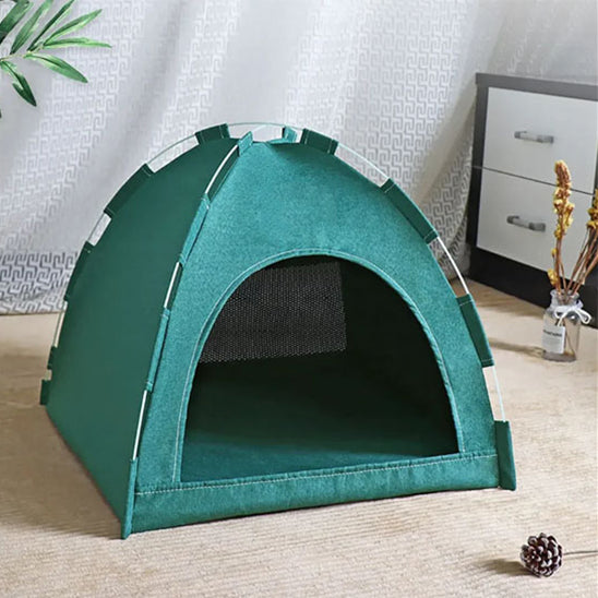 Niche à chat en forme de tente solide verte.
